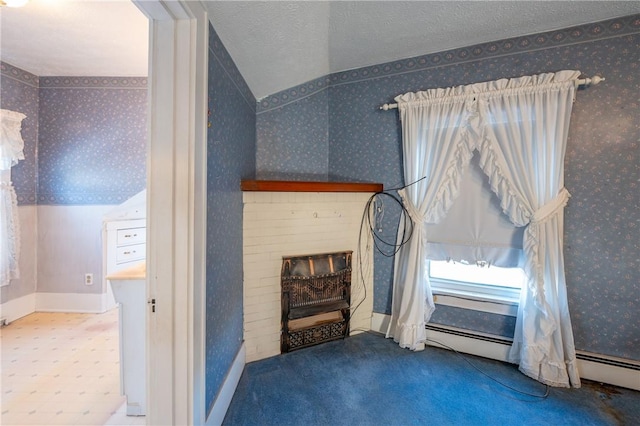 interior space featuring carpet, a fireplace, and wallpapered walls
