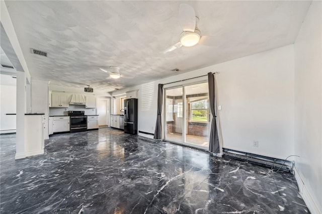 144 Harmony St, Connoquenessing Boro, PA 16027 - unfurnished living room featuring visible vents, marble finish floor, baseboards, ceiling fan, and a baseboard radiator