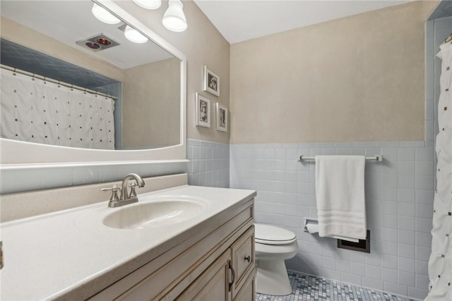 116 Thornberry Dr, Churchill Boro, PA 15235 - bathroom with vanity, tile walls, tile patterned floors, a wainscoted wall, and a shower with curtain