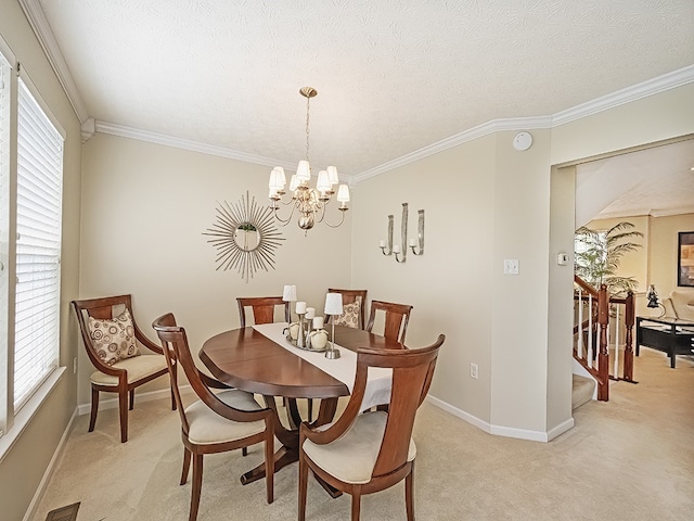 dining area featuring ornamental molding, a chandelier, and light carpet