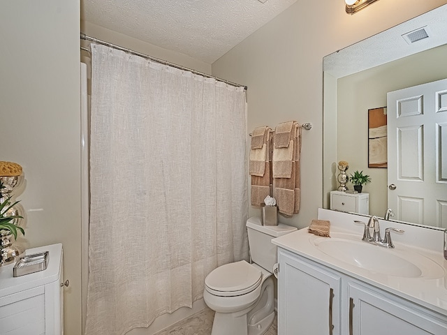 bathroom with a textured ceiling, visible vents, vanity, toilet, and a shower with shower curtain