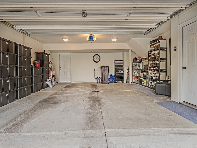 garage featuring a garage door opener