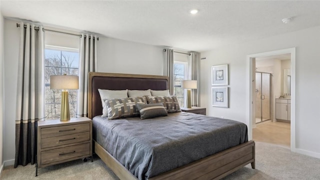 410 Barons Ct, Peters Twp, PA 15367 - bedroom with light carpet, baseboards, and ensuite bathroom