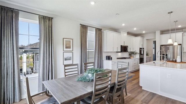 410 Barons Ct, Peters Twp, PA 15367 - dining area with light wood-type flooring and recessed lighting