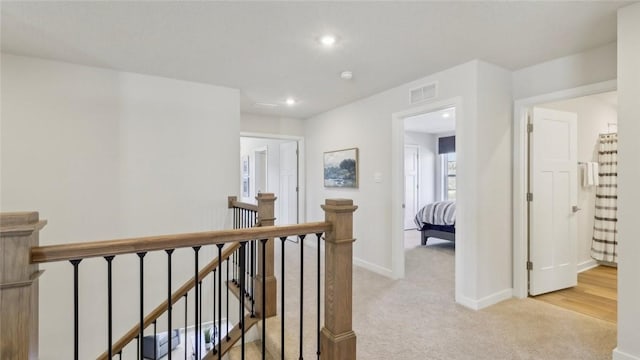 410 Barons Ct, Peters Twp, PA 15367 - corridor with an upstairs landing, light colored carpet, baseboards, and recessed lighting