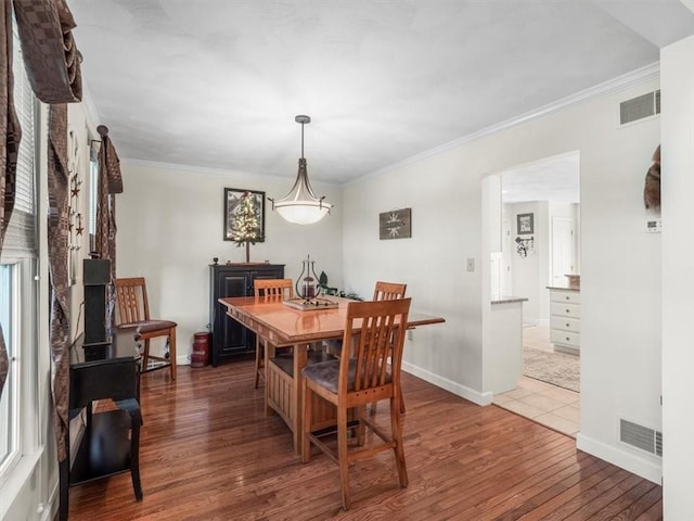 1312 Red Cut Lodge Rd, Derry Twp, PA 15650 - dining room with ornamental molding, wood finished floors, and visible vents