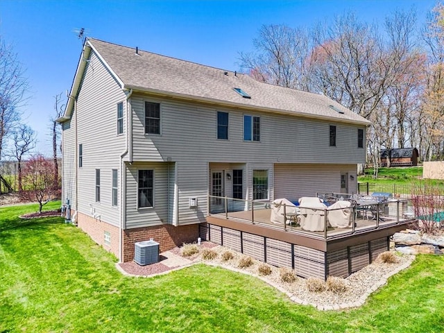 1312 Red Cut Lodge Rd, Derry Twp, PA 15650 - rear view of house featuring a shingled roof, central air condition unit, a yard, and a deck