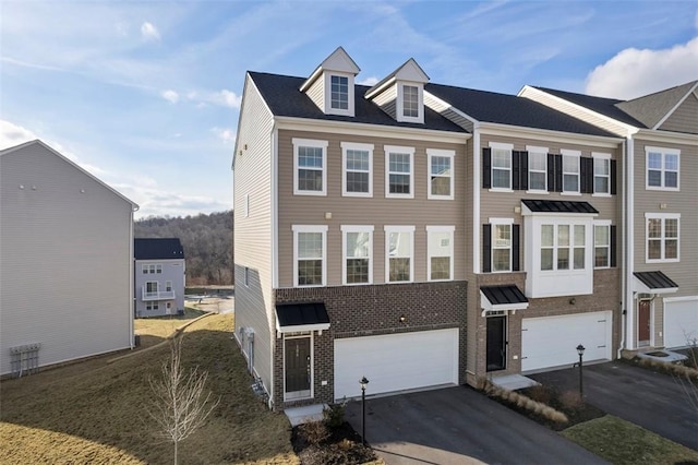 106 Sweetwater Dr, Moon/Crescent Twp, PA 15108 - townhome / multi-family property featuring an attached garage and aphalt driveway