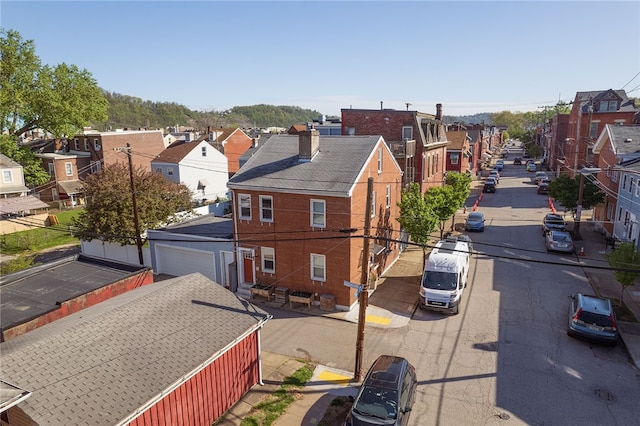 4415 Plummer St, Lawrenceville, PA 15201 - view of asphalt road with a residential view, sidewalks, and curbs