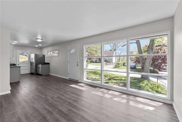 113 Bryant Dr, Penn Hills, PA 15235 - unfurnished living room with baseboards, dark wood-type flooring, and plenty of natural light