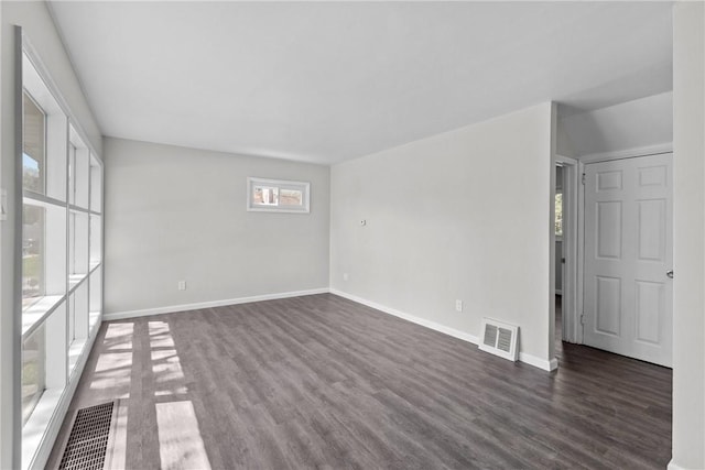 113 Bryant Dr, Penn Hills, PA 15235 - empty room with baseboards, dark wood-style floors, and visible vents