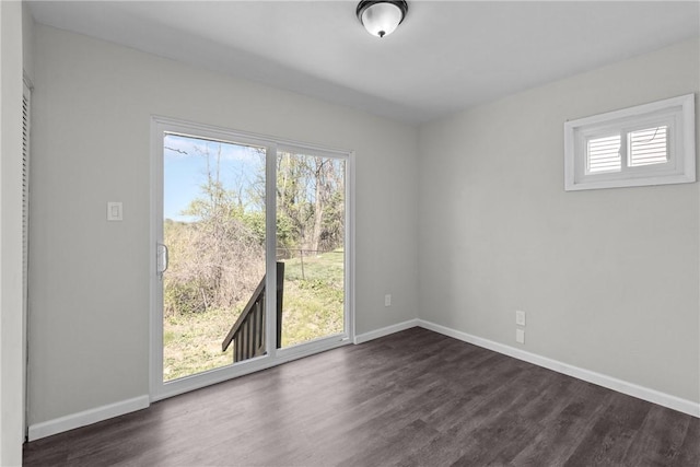 113 Bryant Dr, Penn Hills, PA 15235 - spare room with baseboards, dark wood-style floors, and a wealth of natural light