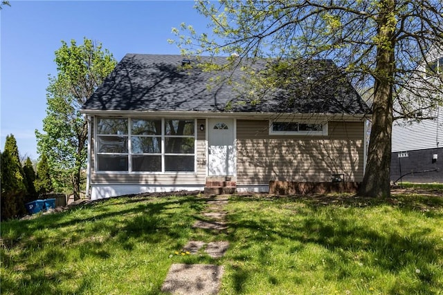 113 Bryant Dr, Penn Hills, PA 15235 - view of front of home with roof with shingles, a front yard, and entry steps