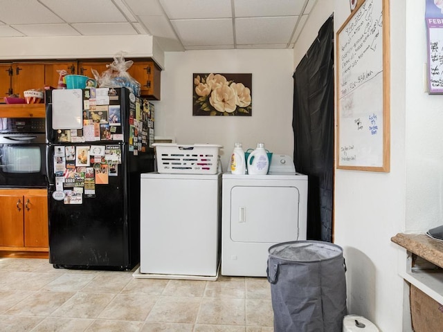 laundry room with separate washer and dryer and laundry area