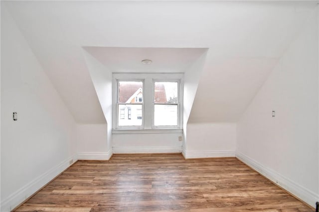 918 California Ave, Avalon, PA 15202 - bonus room featuring baseboards, vaulted ceiling, and wood finished floors