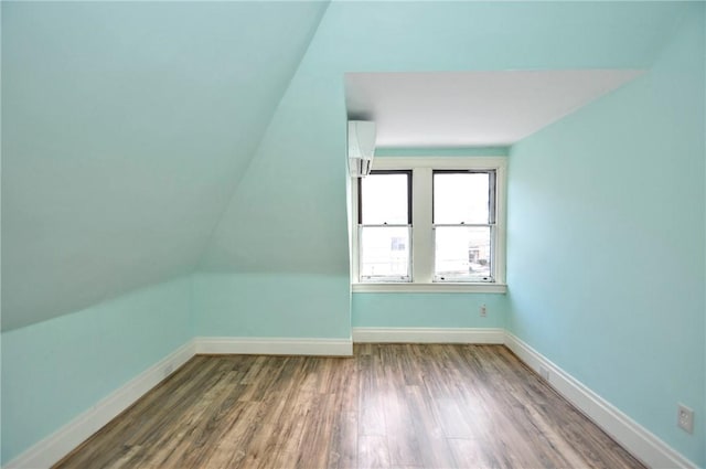 918 California Ave, Avalon, PA 15202 - bonus room with baseboards, lofted ceiling, and wood finished floors