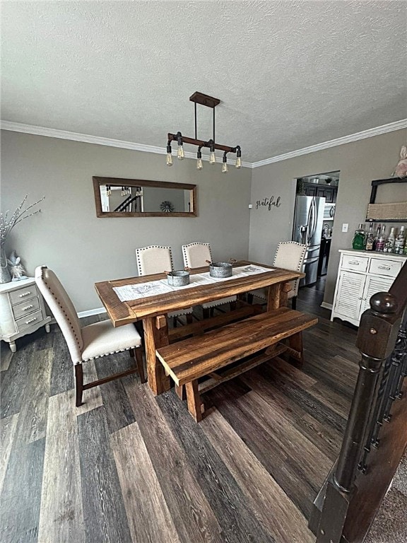 dining room featuring baseboards, ornamental molding, and dark wood-style flooring