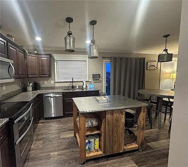 kitchen featuring dark wood-style flooring, open shelves, appliances with stainless steel finishes, dark brown cabinetry, and a sink