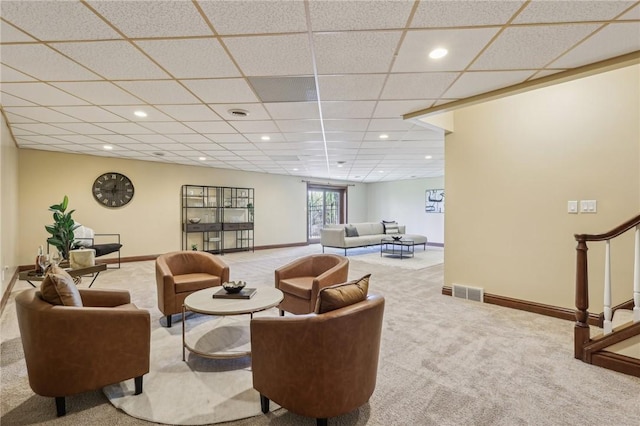 building lobby featuring visible vents and stairs