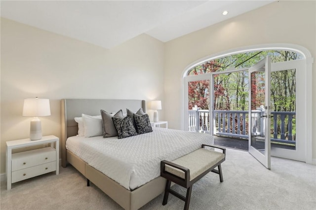 carpeted bedroom featuring recessed lighting and access to exterior