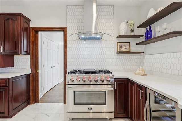 kitchen featuring high end stainless steel range, light countertops, marble finish floor, wall chimney exhaust hood, and wine cooler