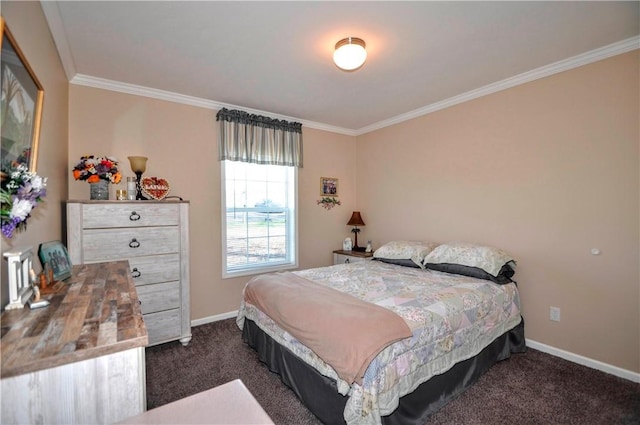 bedroom with dark carpet, ornamental molding, and baseboards
