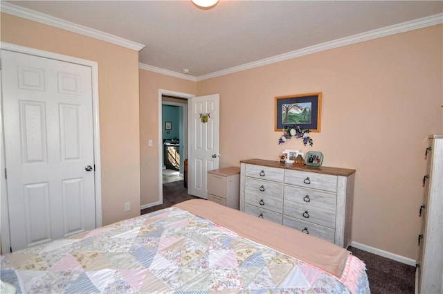 bedroom with crown molding, baseboards, and carpet