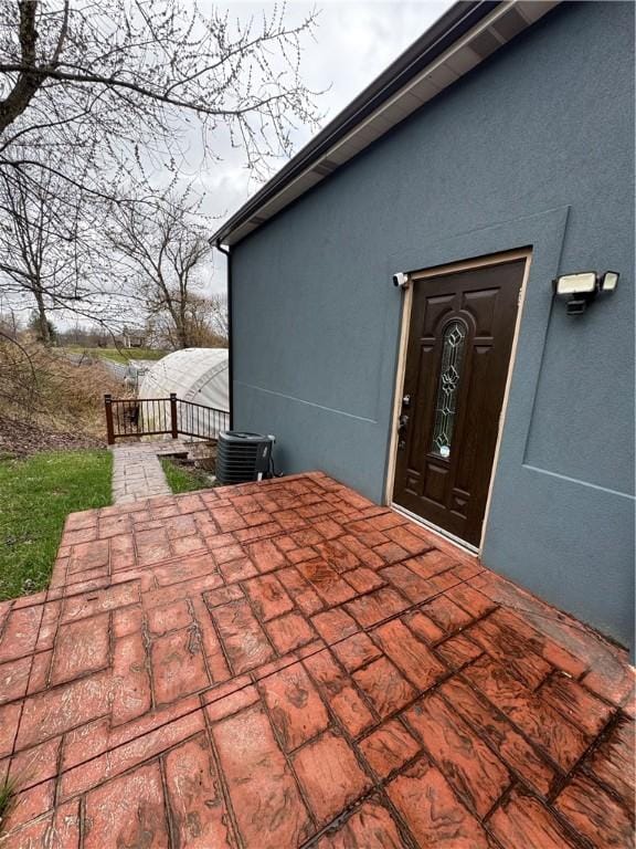 view of patio with cooling unit