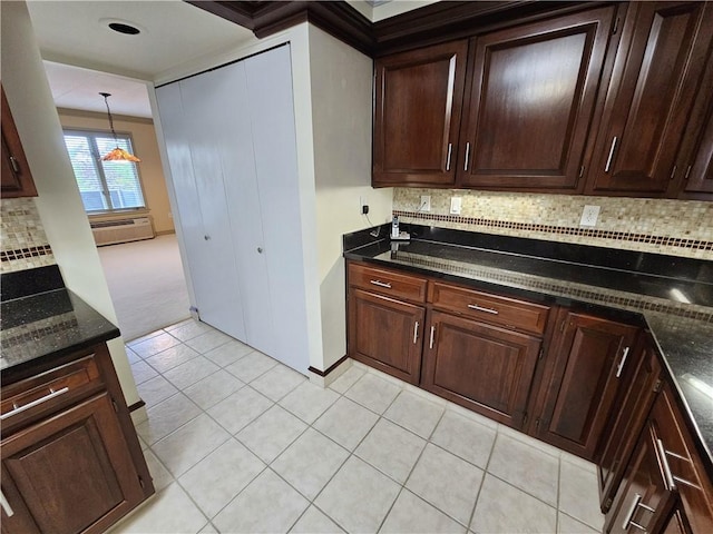 820 E Beau St Unit 2J, South Strabane, PA 15301 - kitchen featuring backsplash, a wall mounted AC, light tile patterned floors, and dark stone counters