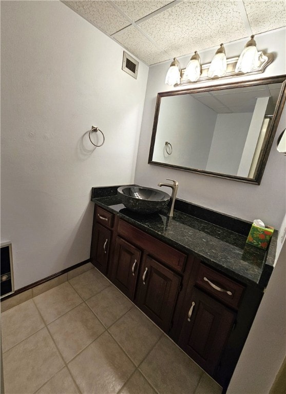 820 E Beau St Unit 2J, South Strabane, PA 15301 - bathroom with visible vents, vanity, baseboards, a drop ceiling, and tile patterned floors