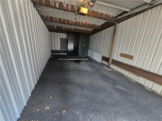 820 E Beau St Unit 2J, South Strabane, PA 15301 - garage featuring a garage door opener and metal wall