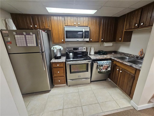 820 E Beau St Unit 2J, South Strabane, PA 15301 - kitchen featuring a sink, light tile patterned floors, and stainless steel appliances