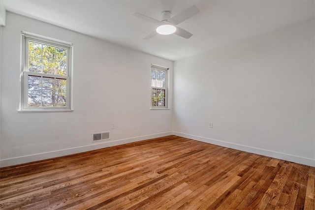 1202 Oakridge Rd, South Fayette, PA 15057 - unfurnished room featuring plenty of natural light, light wood-style floors, and baseboards