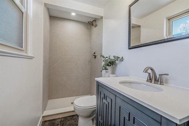 1202 Oakridge Rd, South Fayette, PA 15057 - bathroom featuring toilet, a tile shower, and vanity