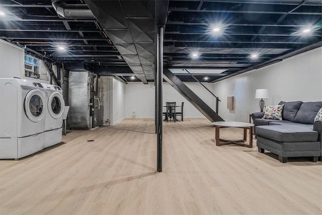 1202 Oakridge Rd, South Fayette, PA 15057 - finished basement with washing machine and dryer, wood finished floors, heating unit, and stairway