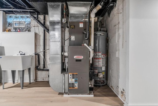 1202 Oakridge Rd, South Fayette, PA 15057 - utility room with water heater and heating unit