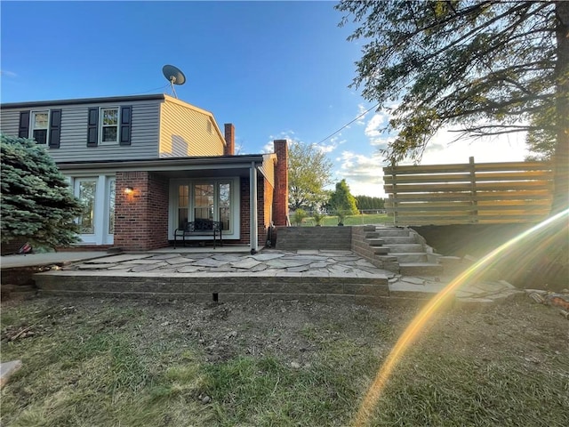1202 Oakridge Rd, South Fayette, PA 15057 - back of house featuring a chimney and brick siding