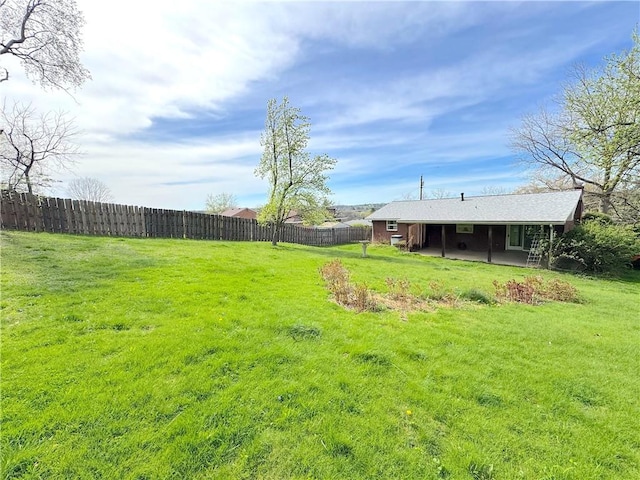 view of yard featuring fence