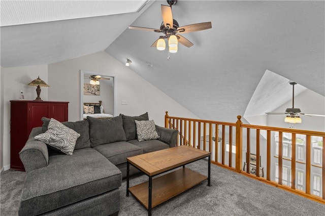 living room featuring ceiling fan, carpet, and lofted ceiling