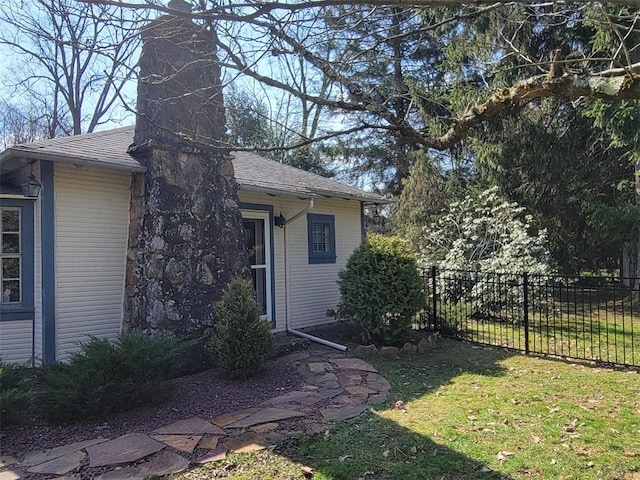 171 Mohawk Trl, Slippery Rock Twp But, PA 16057 - exterior space featuring fence, a shingled roof, a yard, and a chimney