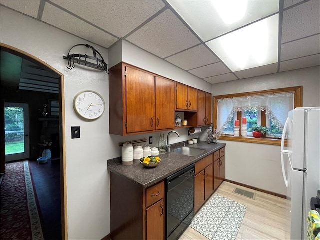 171 Mohawk Trl, Slippery Rock Twp But, PA 16057 - kitchen featuring freestanding refrigerator, dark countertops, a drop ceiling, a sink, and dishwasher