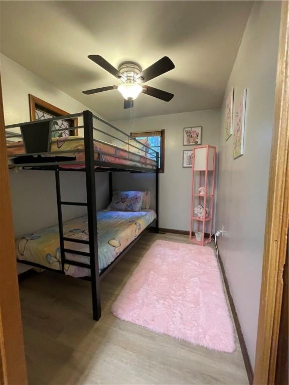 171 Mohawk Trl, Slippery Rock Twp But, PA 16057 - bedroom with baseboards, ceiling fan, and wood finished floors