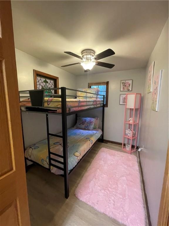 171 Mohawk Trl, Slippery Rock Twp But, PA 16057 - bedroom featuring a ceiling fan and wood finished floors