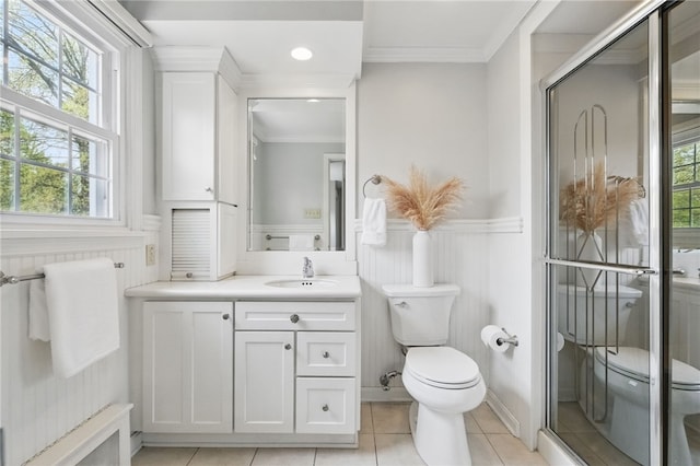 full bath with vanity, ornamental molding, tile patterned floors, and toilet