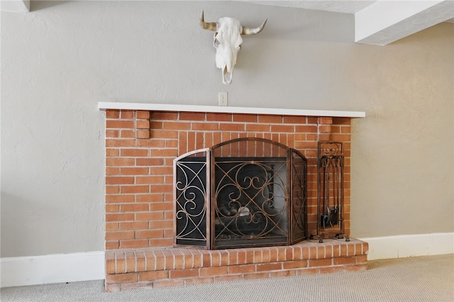 details with carpet and a fireplace