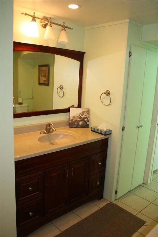 bathroom featuring vanity and tile patterned flooring