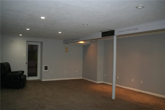 finished below grade area featuring recessed lighting, baseboards, carpet floors, and visible vents