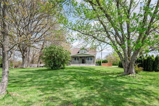 view of yard featuring a porch