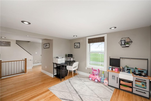 rec room featuring baseboards, recessed lighting, wood finished floors, and visible vents
