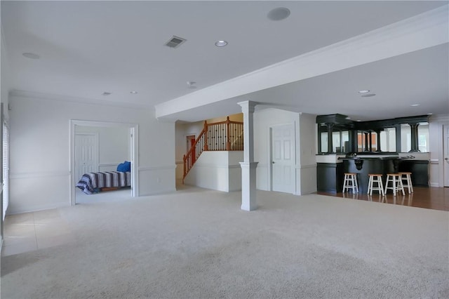 unfurnished living room with recessed lighting, carpet, stairs, and visible vents